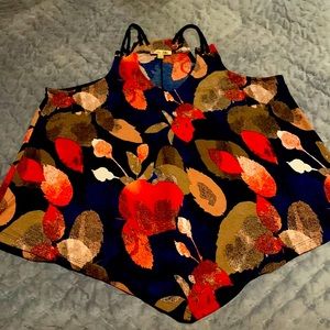 Lavish designer tank top. Gorgeous vivid colors and design. Very flattering